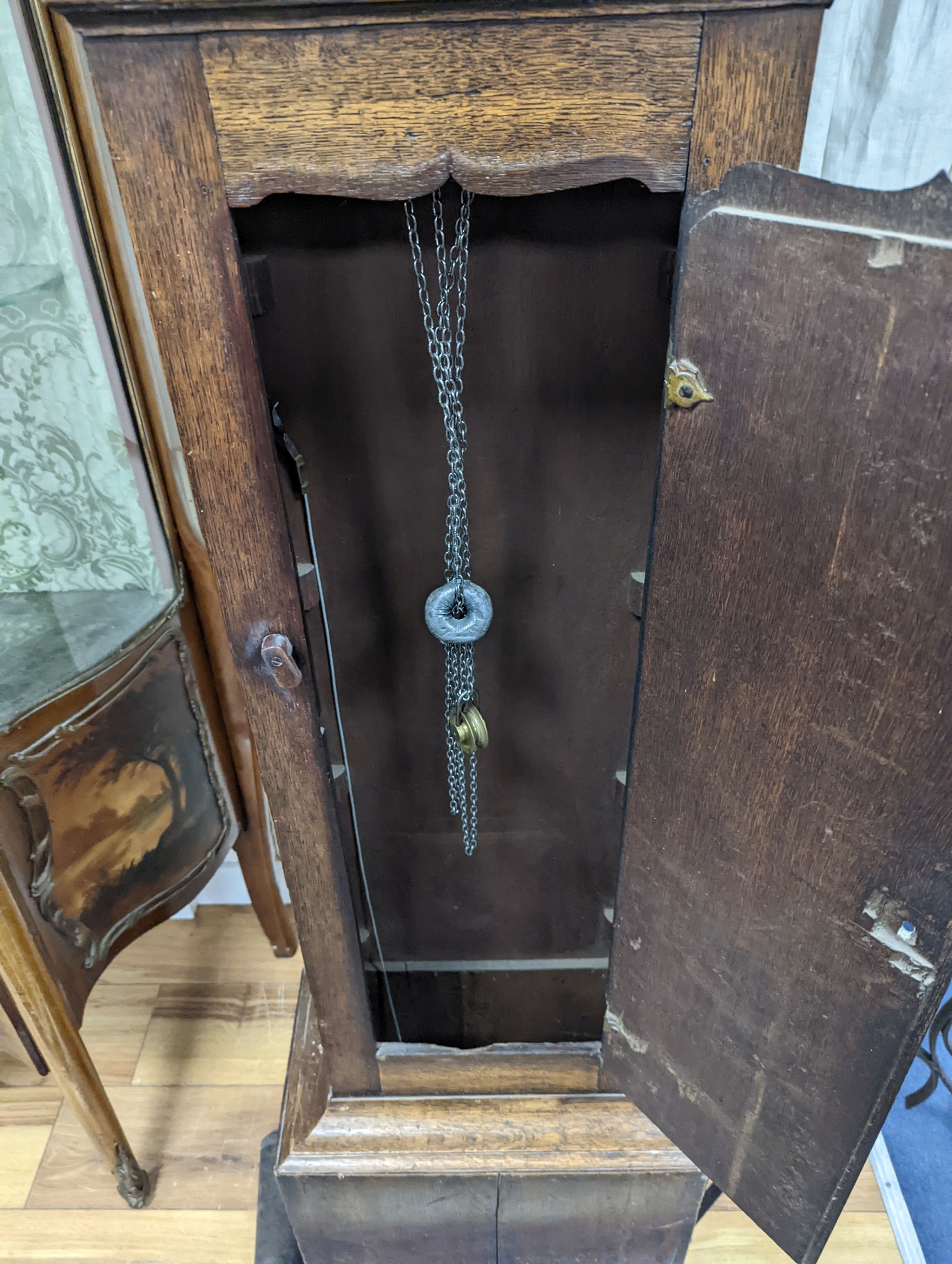 An 18th century oak 30 hour longcase clock with brass dial marked Richard Boyfield, Great Dalby, height 181cm